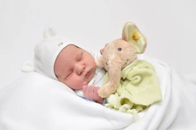 Foto zum Eintrag „Beata und Hans-Jürgen mit Sebastian“